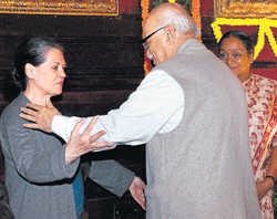 UPA chairperson Sonia Gandhi and BJP leader L K Advani  after paying tribute to former prime minister Indira Gandhi on her 95th birth anniversary at Parliament House in New  Delhi on Monday. PTI