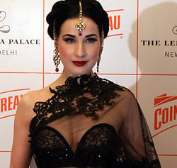 American actress Dita Von Teese, better known as the queen of burlesque, draped in a 'saree' at an event in New Delhi on Tuesday evening. PTI
