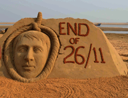 A sand sculpture depicting Mohammed Ajmal Kasab with a hangmans noose around him at a beach in Balasore district, India, Wednesday, Nov. 21, 2012. India executed Kasab, the lone surviving gunman from the 2008 Mumbai terror attack early Wednesday, four years after Pakistani gunmen blazed through India's financial capital, killing 166 people and throwing relations between the nuclear-armed neighbors into a tailspin. AP