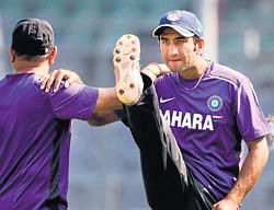 limbering up: Cheteshwar Pujara stretches on the eve of the second India-England Test in Mumbai on Thursday. PTI