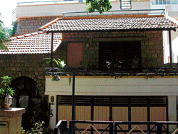 STATELY: The facade of the Satyans home.  (Below) Sustainable  materials have been used in the construction.
