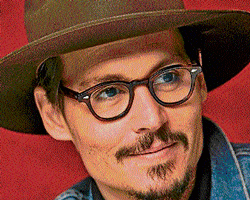 Johnny Depp sport the geek look with aplomb