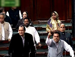 Congress members in the Lok Sabha during Parliament's winter session, in New Delhi on Friday . PTI