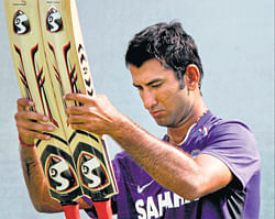 Determined: Cheteshwar Pujara has made a promising start to his Test career. pti