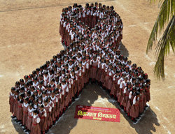 Children take part in an AIDS awareness programme on the eve of World AIDS Day in Karad, Fridabad. PTI
