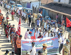 Inam land victims takes out a procession in Kalasa town on Monday.