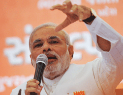 Narendra Modi speaks during a press conference for the upcoming state assembly elections in Ahmedabad. AFP