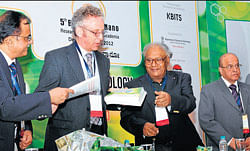 Sir Richard Friend, Cavendish Professor of Physical Sciences, releases the book Nano Companies in India, at the fifth edition of Bangalore&#8200;Nano on Thursday. dh photo