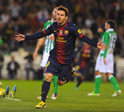 Barcelona's Argentinian forward Lionel Messi celebrates after scoring during the Spanish league football match Real Betis vs FC Barcelona on December 9, 2012 at the Benito Villamarin stadium in Sevilla. AFP