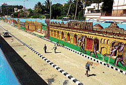 eye-catching: Paintings on the walls of an underpass in JP Nagar. DH Photo