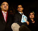 MP Keith Vaz (L) addresses the media as Lisha Barboza stands with her father Ben while he holds a picture of his wife, nurse Jacintha Saldanha, as they leave the Houses of Parliament in London December 10, 2012. Two Australian radio announcers who made a prank call to a British hospital treating Prince William's pregnant wife Kate broke a three-day silence on Monday to speak of their distress at the apparent suicide of the nurse who took their call. REUTERS photo