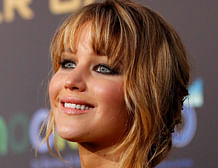 Jennifer Lawrence poses at the premiere of 'The Hunger Games' at Nokia Theatre in Los Angeles, California in this March 12, 2012 file photo. 'The Hunger Games' star, Lawrence, is named the world's most desirable woman, according to an international poll released on Tuesday by the website AskMen. REUTERS photo