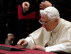 Pope Benedict XVI pushes a button on a tablet at the Vatican, Wednesday, Dec. 12, 2012. Pope Benedict XVI hit the 1 million Twitter follower mark on Wednesday as he sent his first tweet from his new account, blessing his online fans and urging them to listen to Christ. In perhaps the most drawn out Twitter launch ever, the 85-year-old Benedict pushed the button on a tablet brought to him at the end of his general audience after the equivalent of a papal drum roll by an announcer who intoned: 'And now the pope will tweet!' 'Dear friends, I am pleased to get in touch with you through Twitter. Thank you for your generous response. I bless all of you from my heart,' the inaugural tweet read. AP