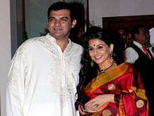 Bollywood actress Vidya Balan with CEO of UTV Motion Pictures Siddharth Roy Kapur at the Sangeet ceremony, ahead of their wedding in Mumbai on Wednesday. AFP