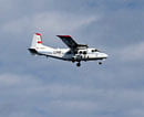 In this photo released by Japan Coast Guard 11th Regional Coast Guard, a Chinese airplane flies in Japanese airspace above the islands known as Senkaku in Japanese and Diaoyu in Chinese in southwestern Japan Thursday, Dec. 13, 2012. AP