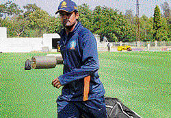 Captain cool: Vinay Kumar walks off after a practice session on Friday. dh photo