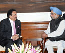 Prime Minister Manmohan Singh with Pakistan's Interior Minister Rehman Malik at a meeting in New Delhi on Saturday. PTI