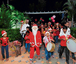 Enthusiastic: Door-to-door carol singing is an integral part of Christmas.  dh photos by shivakumar b h