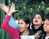 Women activists shout slogans on Tuesday in New Delhi demanding safety for women as they condemn the gang-rape of a 23-year-old student in a city bus. AP