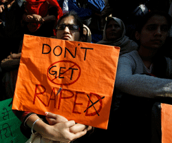 women participate in a protest condemning the gang rape of a 23-year-old student on a city bus late Sunday in New Delhi, India, Tuesday, Dec. 18, 2012. The Indian parliament Tuesday witnessed outrage over the issue even as the victim is battling for her life at a city hospital. AP Photo