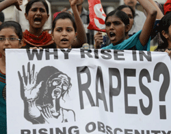 ndian activists protest to support a New Delhi student that was raped inside a moving bus, in Ahmedabad on December 19, 2012. Four people, including the bus driver, have so far been arrested, while a hunt is ongoing for two other suspects. The attack sparked new calls for greater security for women in New Delhi, which registered 568 rapes in 2011 compared with 218 in India's financial capital Mumbai the same year.AFP