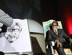An artist sketches bollywood actor Amitabh Bachchan on the eve of 10th Chennai International Film Festival (CIFF) in Chennai on Thursday. PTI