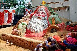 A recreation of Santa Claus in sand on the premises of Infant Jesus Cathedral on Hunsur road in Mysore. DH PHOTO