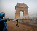 Indian police officers use water canon to clear the area during a violent demonstration near the India Gate against a gang rape and brutal beating of a 23-year-old student on a bus last week, in New Delhi, India, Sunday, Dec. 23, 2012. The attack last Sunday has sparked days of protests across the country. (AP