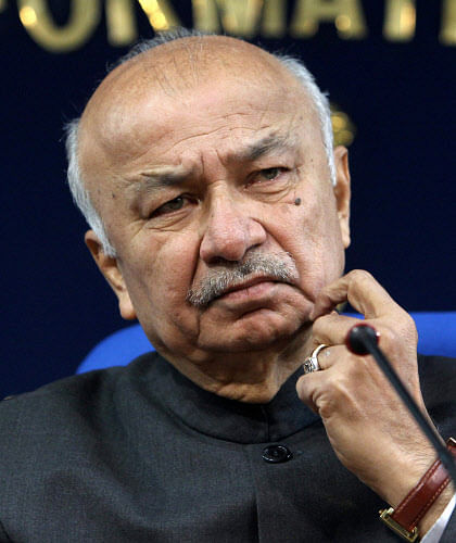 Union Home Minister Sushilkumar Shinde at the press conference in New Delhi on Saturday. PTI Photo by Shahbaz Khan