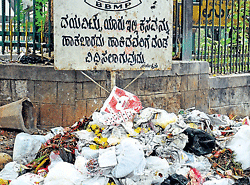 Because of breakdowns in the garbage  disposal system, many residents dispose of their trash in street corners.