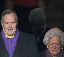 Former US president George H.W. Bush and his wife Barbara arrive for the inauguration of Barack Obama as the 44th US president at the Capitol in Washington on January 20, 2009. The 88-year-old former president, who has been hospitalized for a month undergoing treatment for bronchitis, may not be released from a Houston hospital in time to celebrate Christmas at home as doctors had hoped, according to a spokesman at Methodist Hospital in Houston, Texas on December 23, 2012. AFP PHOTO