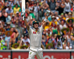 Australia's captain Michael Clarke celebrates reaching his century during the second day of the second cricket test against Sri Lanka at the Melbourne Cricket Ground December 27, 2012. REUTERS