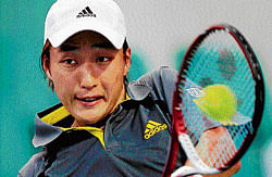Fine start: Japans Go Soeda returns during his opening round win over Evgeny Donskoy in the Chennai Open on Monday. pti