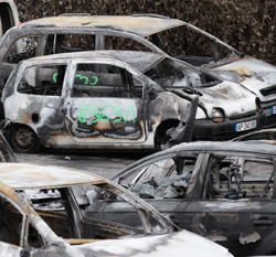 Cars torched during New Year's Eve in Strasbourg's area are parked at the pound of Strasbourg, eastern France January 1, 2013. REUTERS