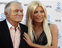 Hugh Hefner and his fiancee, Playboy Playmate Crystal Harris, arrive at the opening night gala of the 2011 TCM Classic Film Festival featuring a screening of a restoration of 'An American In Paris' in Hollywood, California April 28, 2011.  Credit: Reuters/