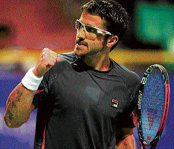 moving up: Janko Tipsarevic celebrates his win over Roger-Vasselin in the second round of the Chennai Open on Wednesday. PTI