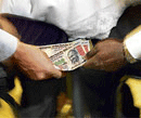 Rajasthan SP held for extorting money from juniors