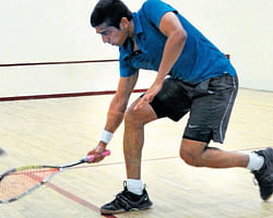 In fine touch: Saurav Ghosal in action against Ravi Dixit in the Bangalore Invitational squash on Friday. DH PHOTO