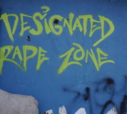 A graffiti sign which reads 'Designated Rape Zone' tagged on a wall in New Delhi on January 4, 2013. The piece is said by local newspapers to be by noted artist 'Rush' in an attempt to highlight the dangers to young women across the Indian capital where a 23 year old student was gangraped and beaten by six assailants on December 16, and died of her injuries. AFP PHOTO