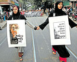 Students and teachers take part in a protest march over crimes against women in Kolkata on Saturday. PTI