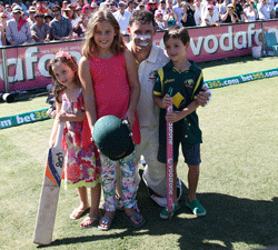 Australia's Michael Hussey poses with his children Jasmin, 2nd left, William, right, and Molly after Australia won their third cricket test match against Sri Lanka in Sydney, Australia, Sunday, Jan. 6, 2013. Australia won the match and the series 3-0. (AP Photo