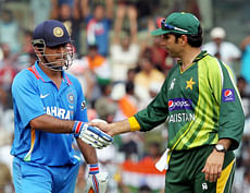India's MS Dhoni being greeted by Pakistan skipper Misbah-ul-Haq. PTI file photo