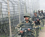 Border Security Force  soldiers patrol along the India-Pakistan border in Suchitgarh near Jammu on Thursday. PTI
