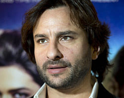 Indian Bollywood actor Saif Ali Khan poses for pictures during a photo call for his new action thriller film 'Race 2' in London on January 14, 2013. AFP PHOTO/