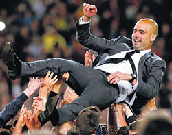 CLASS ACT: Pep Guardiola coached Barcelona to 14 title-victories in 16 attempts.