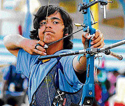 determined Abhiraj Singh shoots in the Recurve Mixed Team Event in Bangalore on Saturday. DH photo