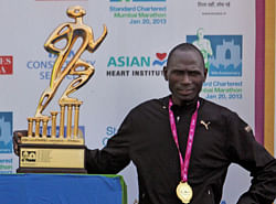 Mumbai Marathon Elite winners, Jackson Kiprop after finishing the marathon in Mumbai on Sunday. PTI