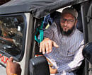 MIM chief and MP, Asaduddin Owaisi after appearing before a court in Sangareddy town of Medak district on Monday in connection with a 2005 case. PTI Photo