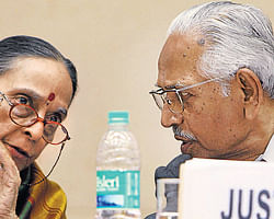 Justice JS Verma talks with Justice Leela Seth during a press conference after submitting his committee's report to the government in New Delhi on Wednesday. The committee was set up to recommend measures to improve laws dealing with sexual offences. Committee member Justice Leela Seth is also seen. PTI Photo by Subhav Shukla