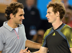 Britain's Andy Murray (R) is congratulated after victory in his men's singles semi-final against Switzerland's Roger Federer (L) on day twelve of the Australian Open tennis tournament in Melbourne on January 25, 2013. AFP